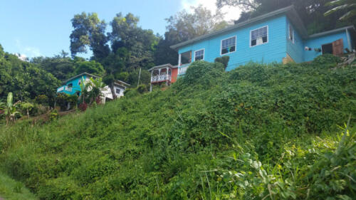 Blue House on Hill