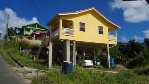 Yellow Home on Stilts