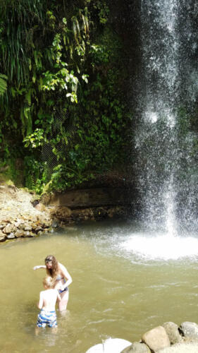 Waterfall with mom and son